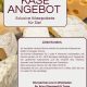 Käseangebot von Arnos Weinladen: verschiedene Käsesorten mit Trauben auf einem Brett
